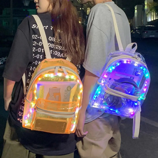 Tote bags for schools Adjustable Straps Waterproof featuring stylish LED light designs in a nighttime setting.